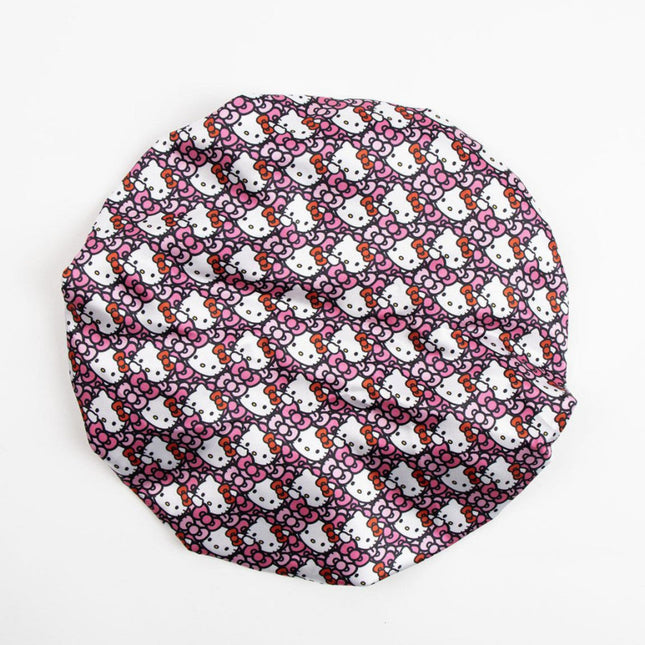 Hello Kitty mintás fürdősapka kislányoknak, kényelmes és vízálló kialakítással, hajvédelemhez fürdés vagy zuhanyzás közben.